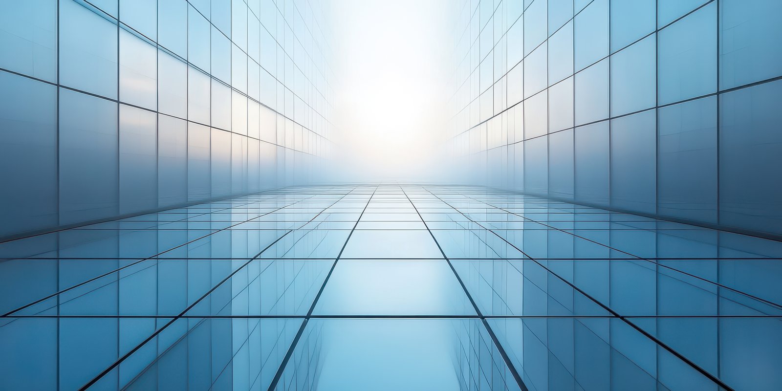 Reflections in modern architecture create an otherworldly atmosphere during early morning light